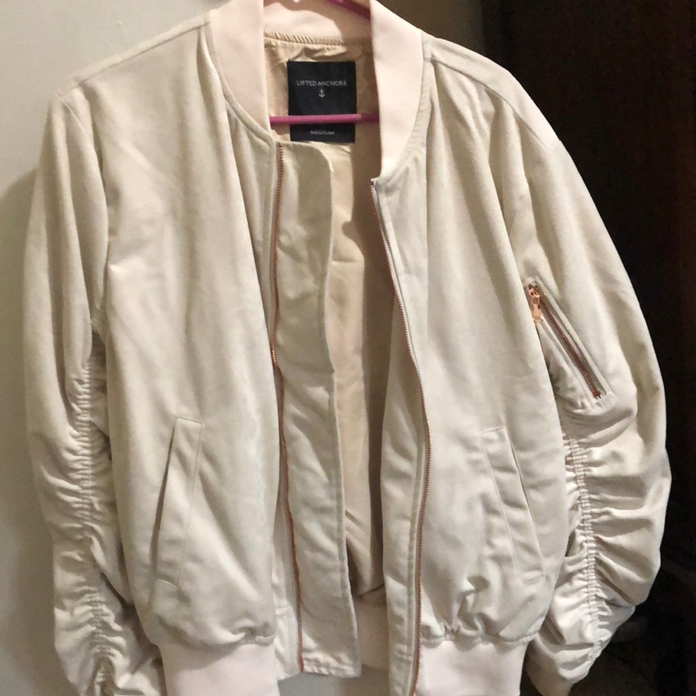 Lifted anchors off white bomber